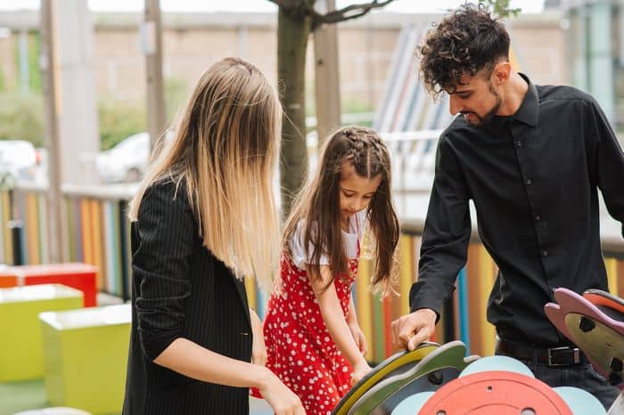 Family having a no spend day at the park as a way of managing their money better.