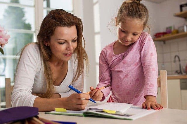 A parent and child boosting imagination with creative writing