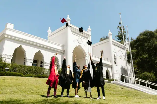 Watching graduates throw the mortar boards in the air is a great way to prepare your child for university.