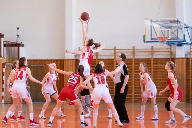 Children playing in a school sports team with a passion for netball