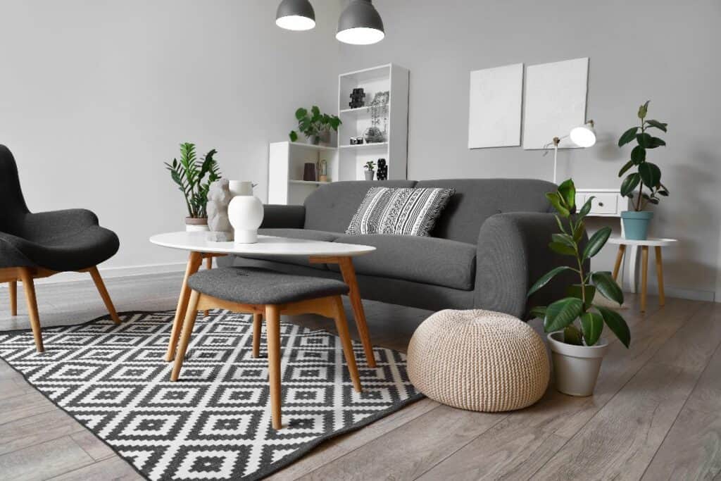 Stylish grey living room showing luxury living on a budget ideas.