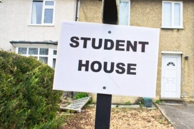 Student House Signpost with benefits of living off campus.