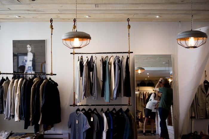 inside a well lit luxury clothes store 