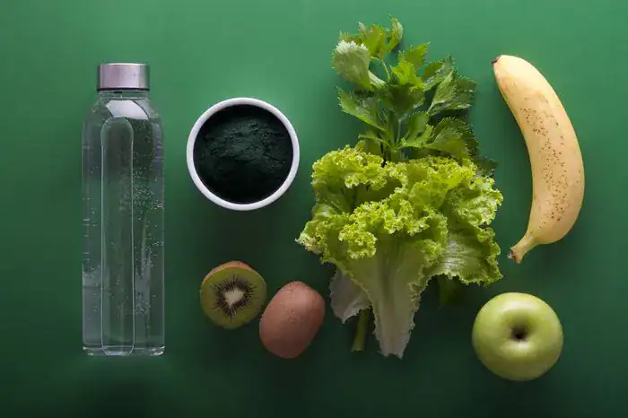 Flatlay of healthy food and a water bottle.