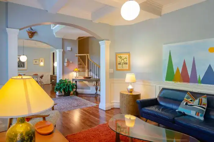 A colourful, open plan living room for a family.
