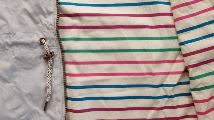 Funky, bright coloured horizontal colours in the lining of a Lighthouse Clothing Jacket.