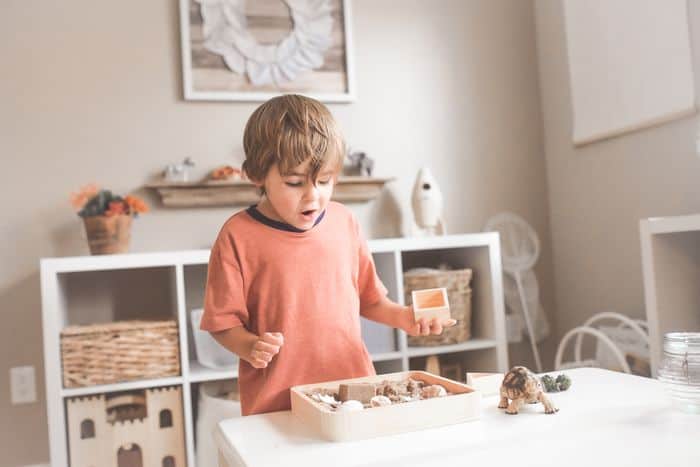 Child playing in a playroom designed for a child friendly home.