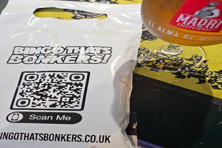 Bingo Thats Bonkers review, with a pack and pint of beer.