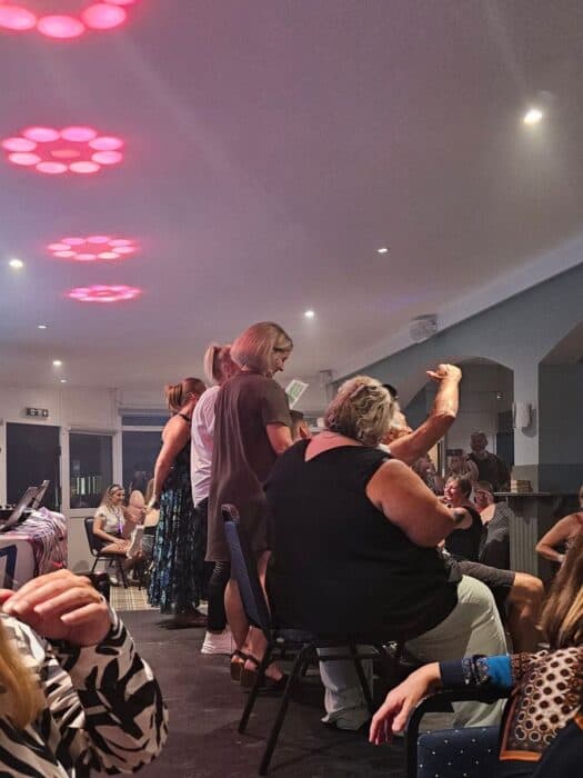 Party Games at Bingo Thats Bonkers with women up on the stage ripping wax strips off men.