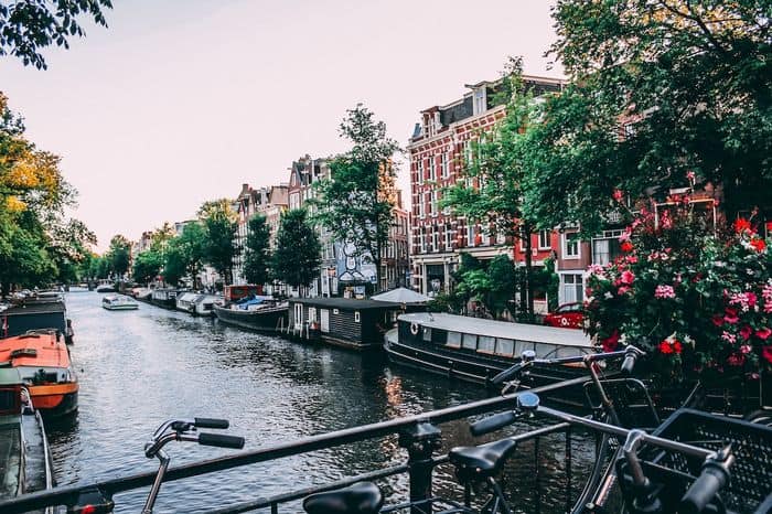 Overlooking bridge in Amsterdam for unforgettable European city breaks ideas.