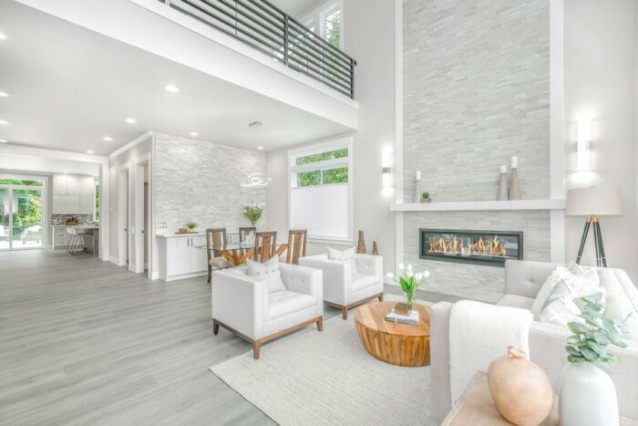 A white, minimalist open plan house showing how to create an elegant home.