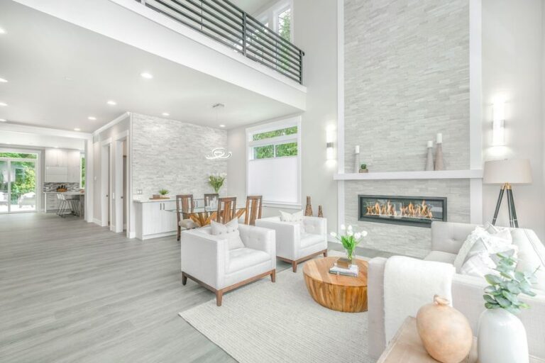 A white, minimalist open plan house showing how to create an elegant home.