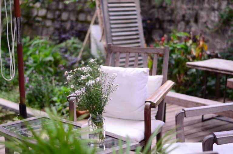 A garden with chairs that has been prepared for Autumn.