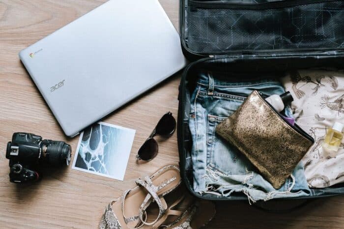 Someone packing a suitcase for their travels.