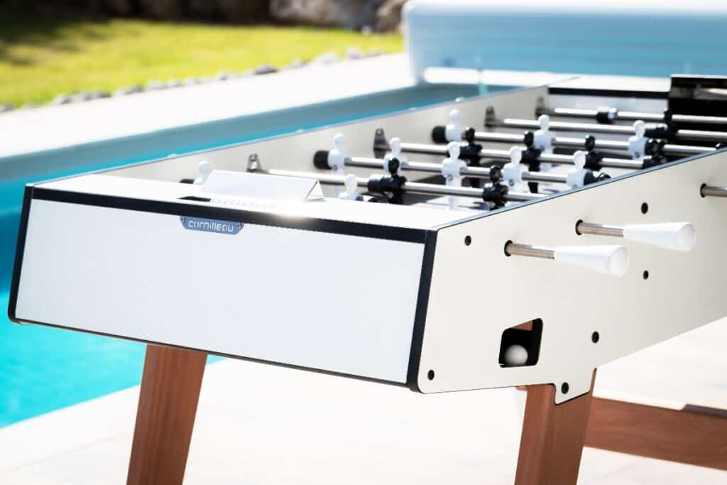 White Cornilleau outdoor table football with wooden legs, a fun gift for grandparents