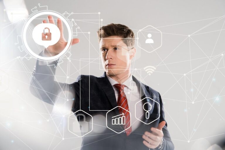 Business owner securing data with digital lock icons, symbolising how to protect your small business from cyber threats and risks.
