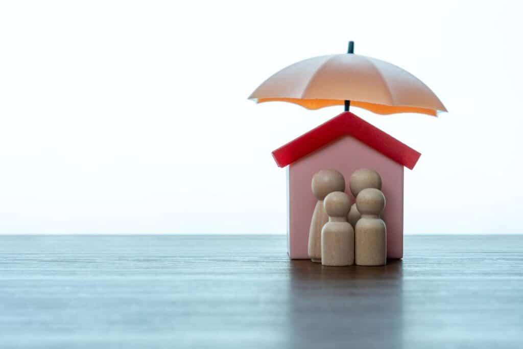 Why termite damage is not covered by insurance: home and family under an umbrella