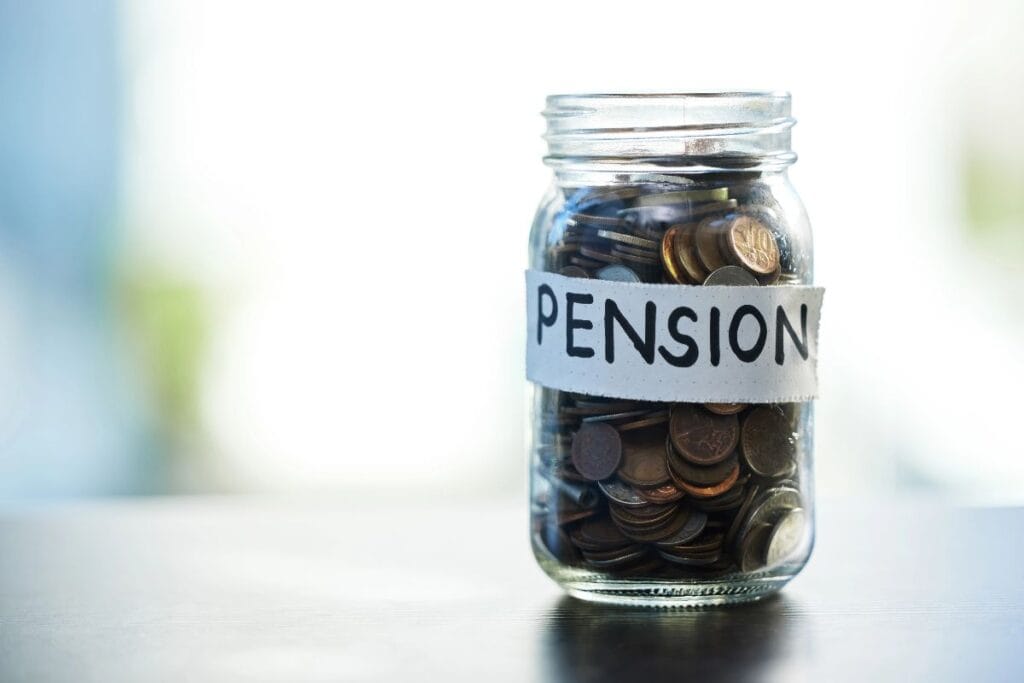 Jar of coins labelled “pension”, representing pension savings considered in divorce settlement.