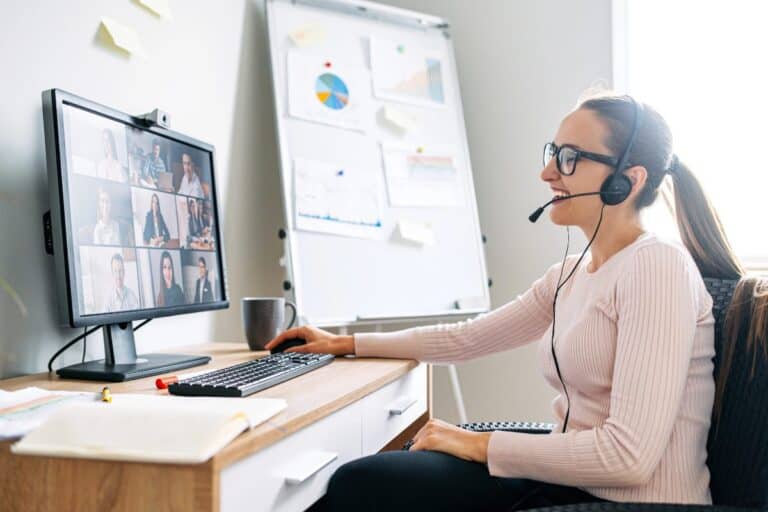 Remote worker on a video call using a headset at home