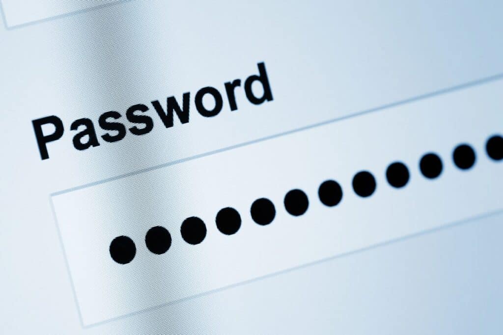 Close-up of a password field on screen with hidden characters — strong passwords for online safety.