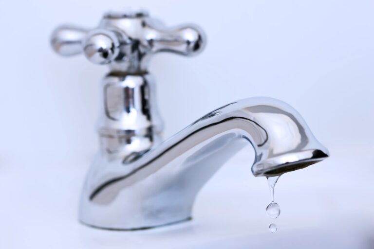 Dripping tap showing a common plumbing problem at home.