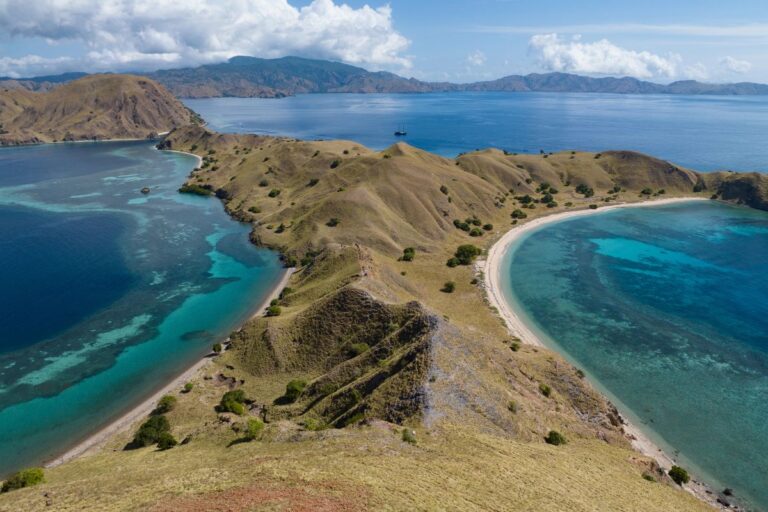 Coastal islands and turquoise waters in Komodo National Park, Indonesia.
