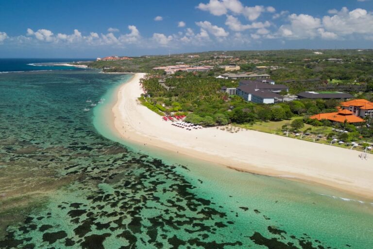 Aerial view of Nusa Dua beach and shallow reef in Bali, Indonesia